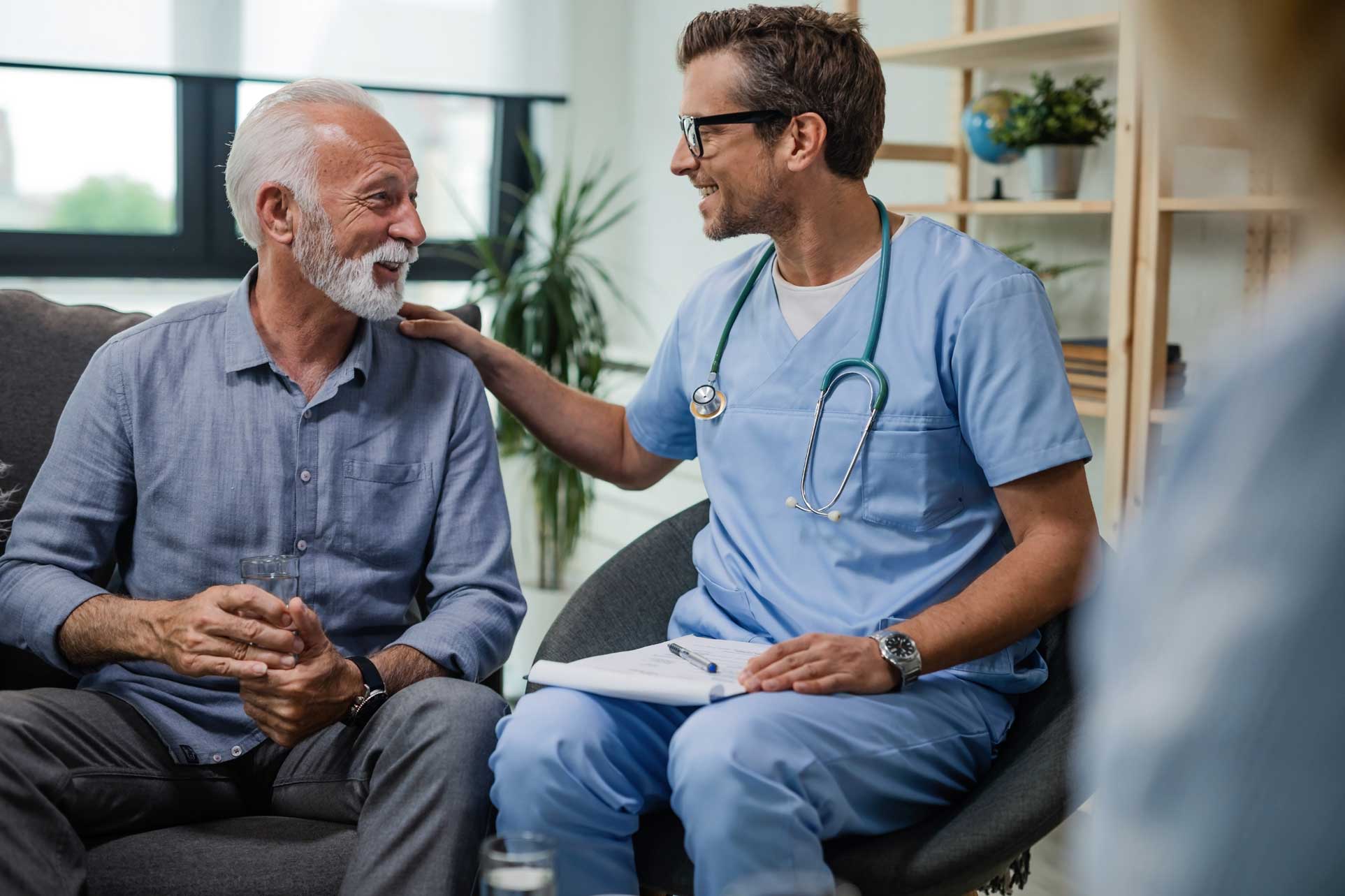 Male patient talking with male doctor.